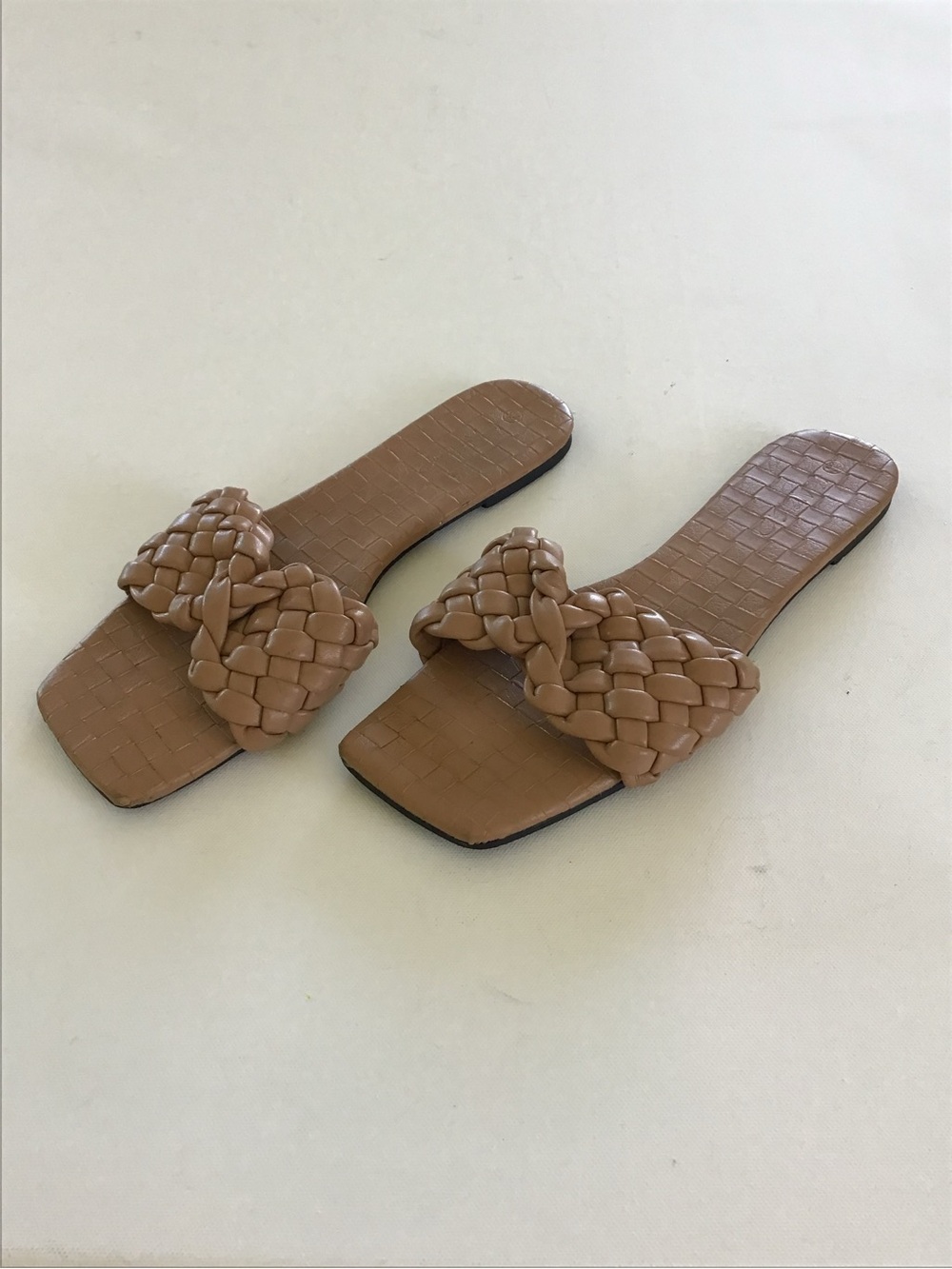 LAICIGO brown slip-on sandals feature a prominent woven, braided band